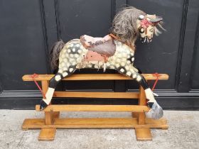 A vintage dapple grey rocking horse, 126cm long