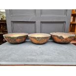 A large set of three 19th century Continental papier mache bowls, with polychrome and gilt