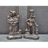 A pair of Victorian cast iron 'Ally & Mrs Sloper' doorstops, 28.5cm high.