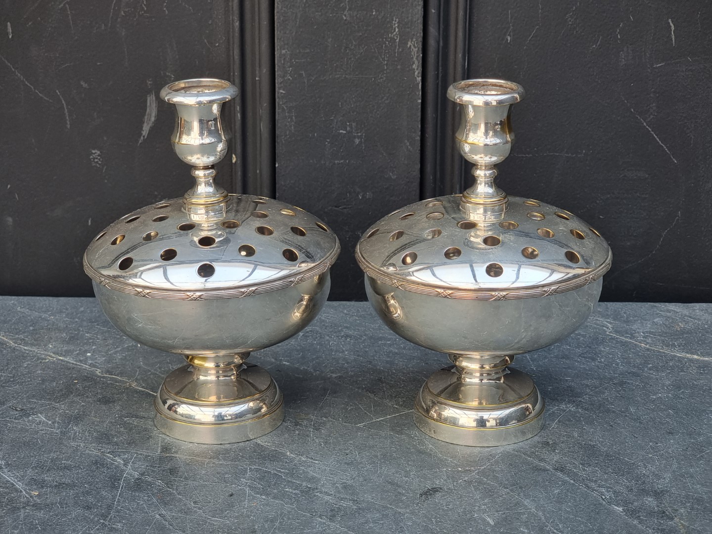 A pair of Christian Dior electroplated pot pouri candlesticks.