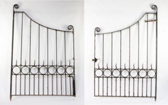 A pair of wrought iron garden gates