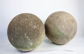 A pair of large composition stone balls