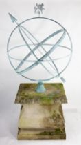 A large bronze armillary on limestone pedestal