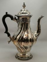 An Edwardian silver coffee pot