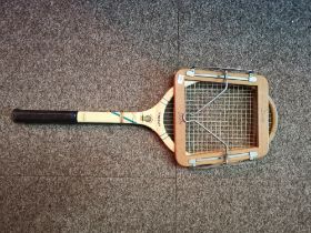 Vintage 1950s Slazenger tennis racket with wooden frame and Dunlop wooden press