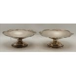 A pair of Edwardian silver miniature pedestal dishes