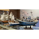 Three wooden model sailing vessels
