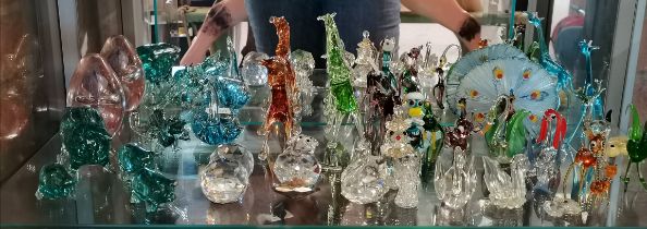 A large collection of vintage miniature handblown glass and crystal figurines