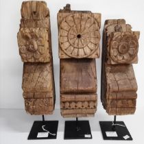Three carved Indian hardwood brackets