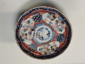 Oriental pattern dish with x4 character marks under