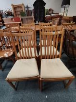 A Set of 6 Ercol Penn Dining Chairs with cream cushions