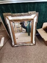 A pair of gilt and marble effect wall mirrors