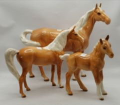 Three Beswick palomino horse models