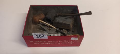 Tin of vintage items including 2 old pipes