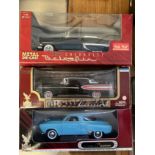 Three die-cast scale model American vehicles