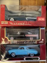 Three die-cast scale model American vehicles