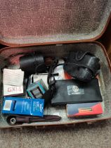 Small travel case with photographic equipment