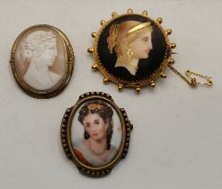 A group of three brooches