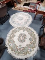 x2 round cream, light green and light blue rugs