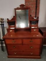 A Victorian mahogany dressing table with Swan neck brass handles and tilt mirror