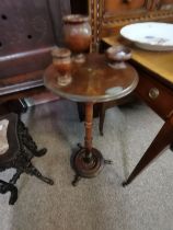 An antique fruitwood smokers stand