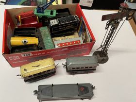 A collection of tin plate model railway stock and other