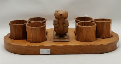 Colin Almack, a Beaverman oak napkin ring stand and six napkin rings