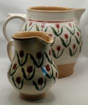 Two Nicholas Mosse tulip pottery jugs