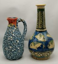 A French pottery jug, and a bottle vase