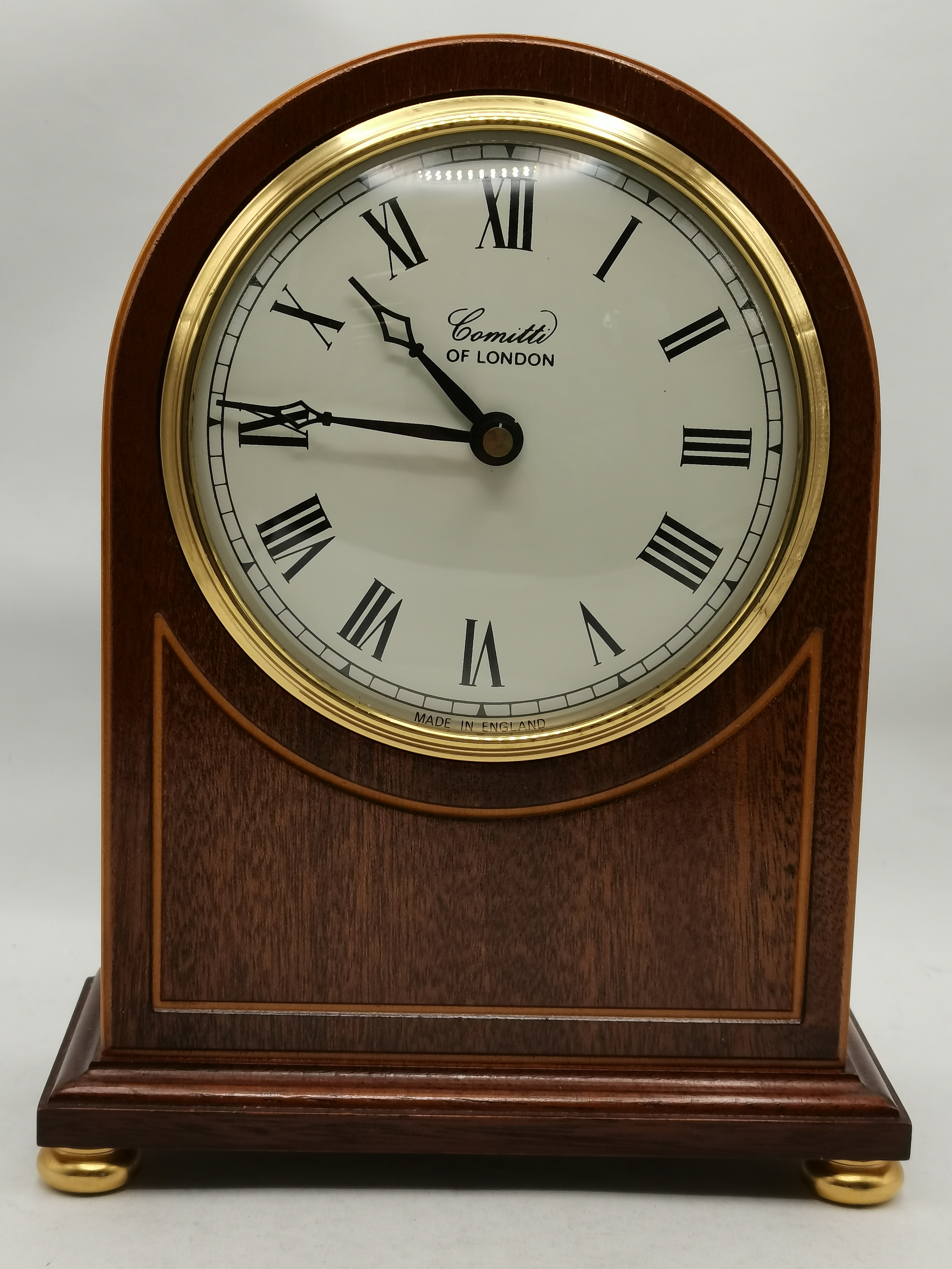 A mahogany arch-top mantel clock, mid-20th Century