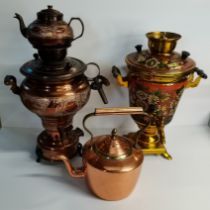 A copper kettle, and two Russian Soviet-era electric samovars