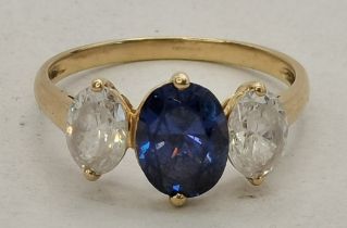 A 14 carat gold three-stone ring