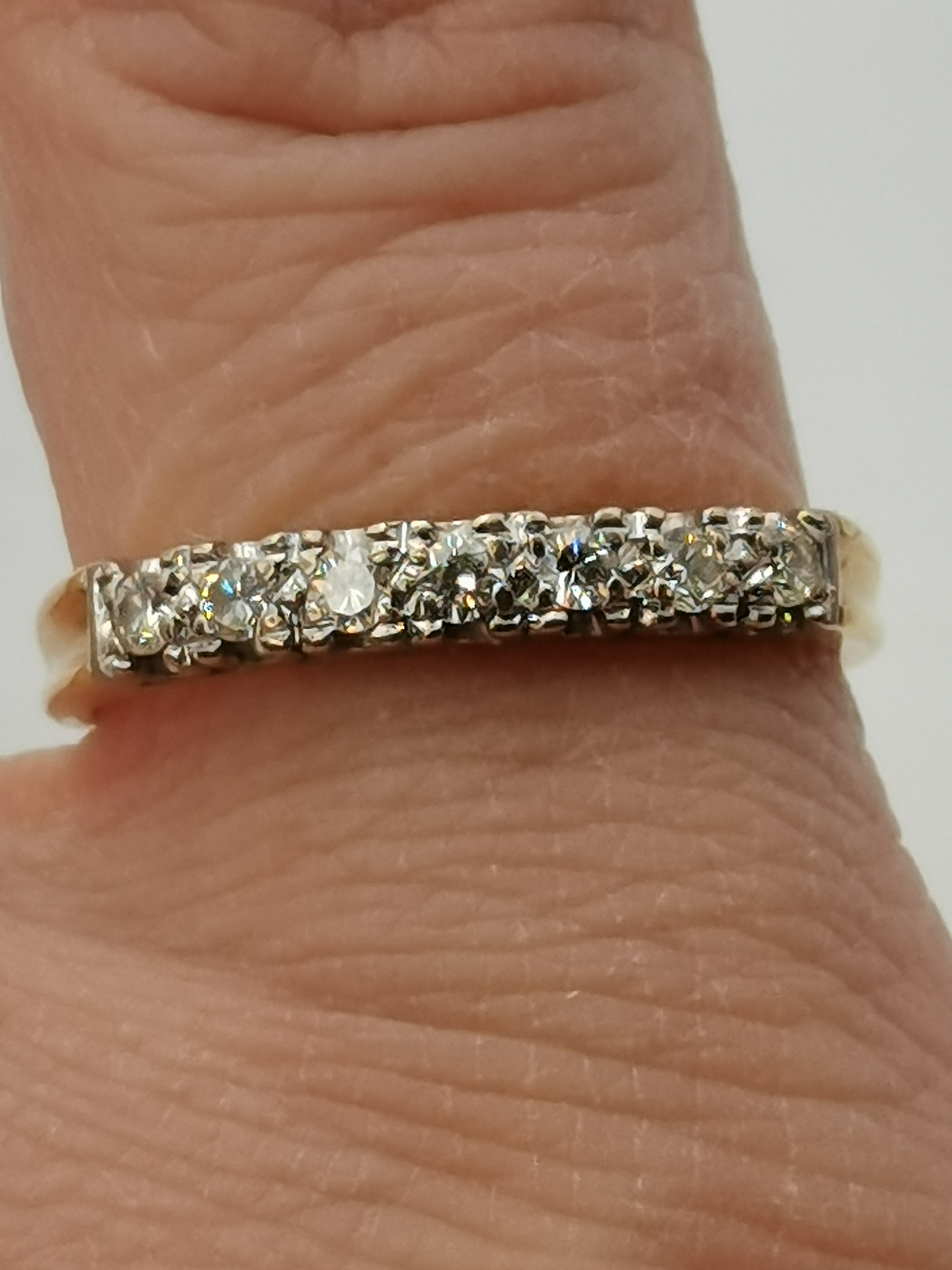 An 18 carat gold half hoop seven-stone ring - Image 3 of 3