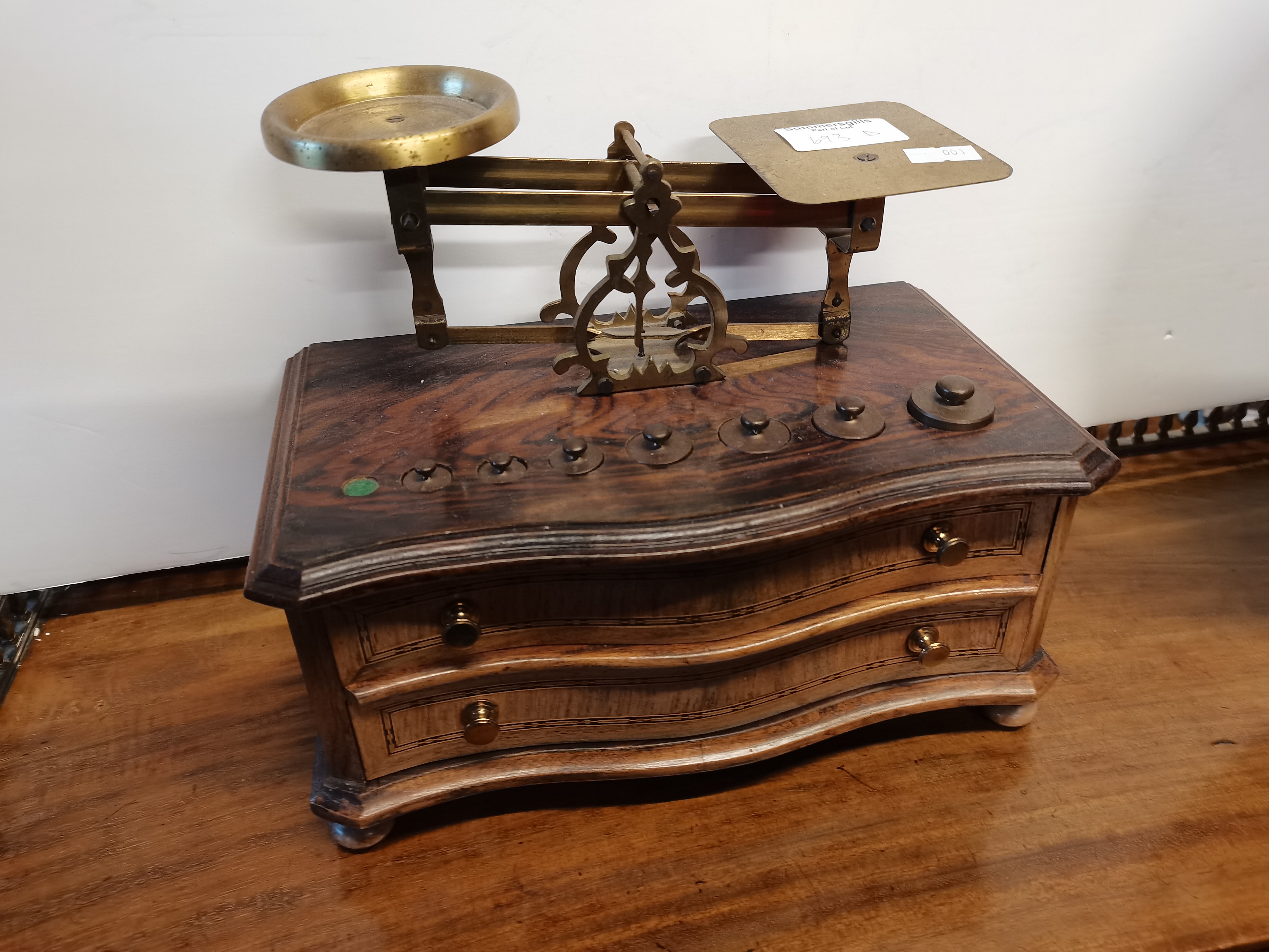 A quality inlaid mahogany set of postal scales with 2 drawers ( 1 weight missing )