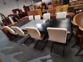 A set of 6 Scandinavian designer dining chairs and a matching extending dining table with 2 leaves
