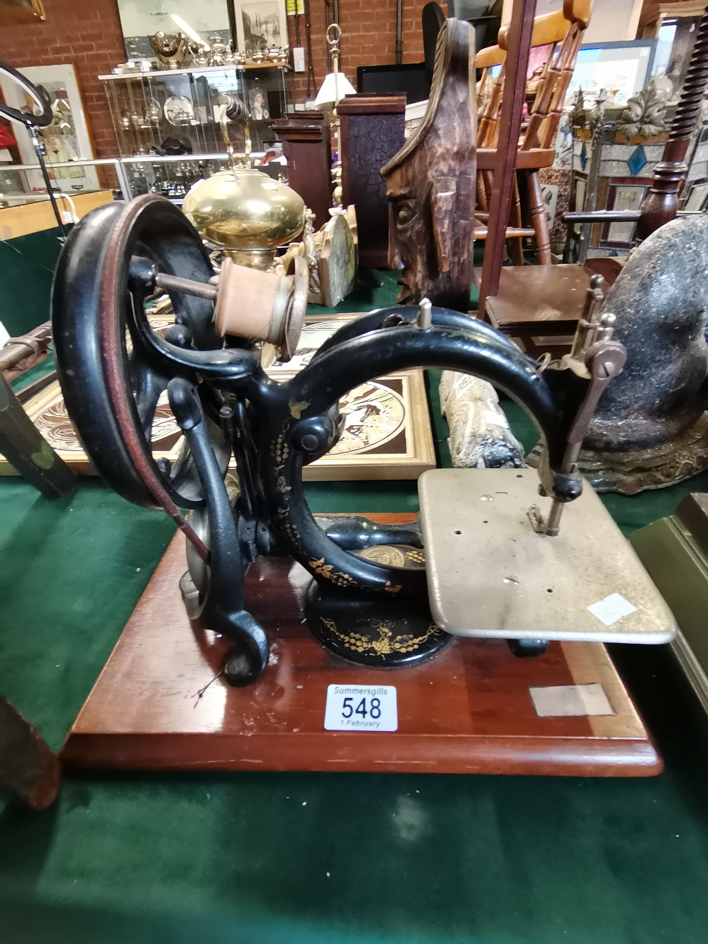 An automatic tension hand sewing machine, early 20th Century