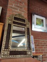 A Moorish mother-of-pearl inlaid mirror