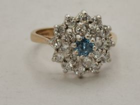 A 9 carat gold cluster ring