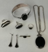 A collection of silver and hardstone jewellery