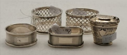 Four 20th Century silver napkin rings and a 19th Century Dutch silver box