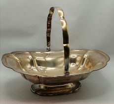 A George V silver swing-handled basket