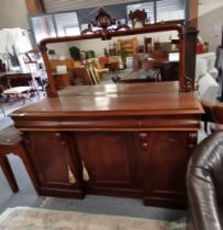 A Victorian mahogany chiffonier with Mirror back with shaped and moulded mahogany frame