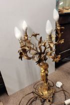 A 60cm gilt cherub decoration table lamp