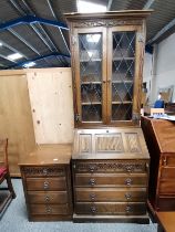 A Wood Brothers Old Charm Oak set of drawers and matching Bureau Bookcase