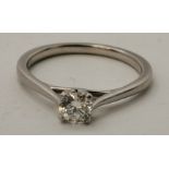 A platinum and diamond solitaire ring