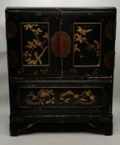 A Japanese black lacquered tabletop cabinet, 19th Century