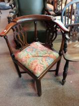 A yew wood early corner chair