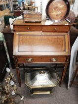 An Antique mahogany and inlaid ladies desk with gilt frieze