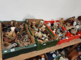 A large collection of pottery figure, and books