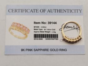 A 9 carat gold pink sapphire ring